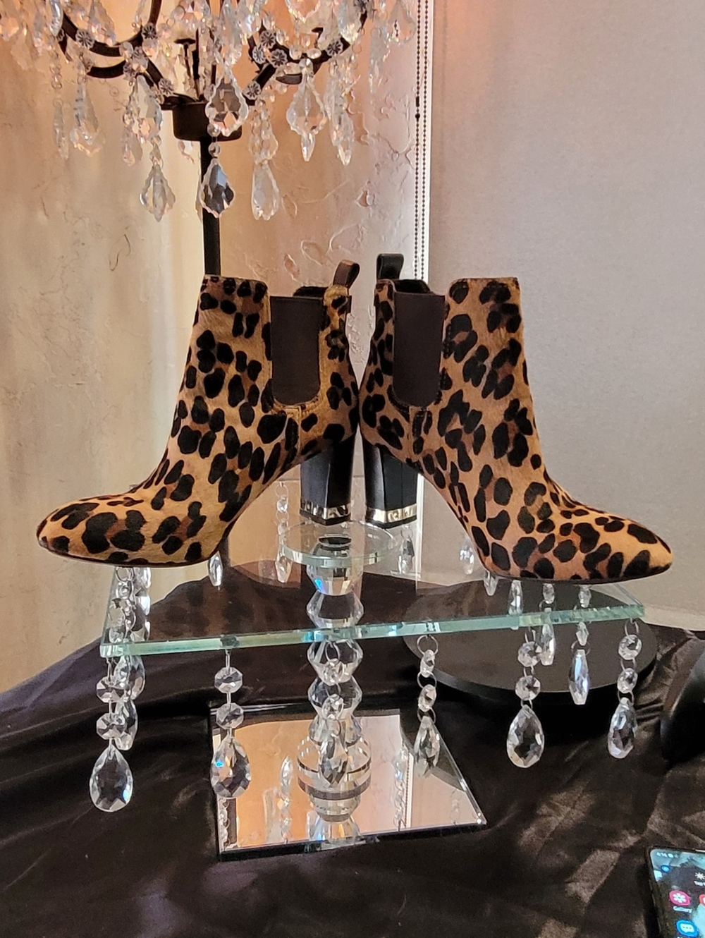 Leopard-print Booties designed by Tory Burch and feature a classic Chelsea 7M